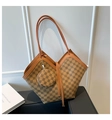 Close-up of retro brown checkerboard tote bag with detachable round coin purse detail - Brown