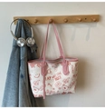 Detail of white tote bag with red cartoon graffiti prints and pink shoulder straps - Pink