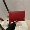 Chic large red envelope clutch bag in matte faux leather with wristlet strap and flap - Burgundy