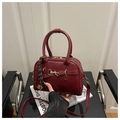 Dark red Boston handbag in smooth faux leather with golden horsebit and woven charm - Burgundy