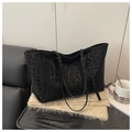 Detail of black leopard print tote bag with soft texture and slim double handles - Black Without Pendant