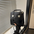Fashionable black faux leather mini backpack for women featuring silver star buckle details - Black