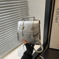 Silver metallic mini backpack with star buckles and adjustable straps in Y2K style - Silver