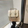 Mini preppy backpack in cream and coffee faux leather with silver star metal buckles - White
