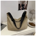 Minimalist khaki waterproof nylon crescent tote bag with adjustable black shoulder strap - Khaki
