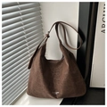 Detail of dark brown leopard embossed suede tote bag with adjustable silver buckle strap - Coffee Without Pendant