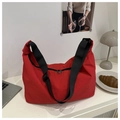 Waterproof red nylon hobo bag with adjustable black shoulder strap and large capacity - Red