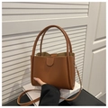 Minimalist tan retro bucket bag in synthetic leather with dual handles and long strap - Brown