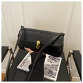 Classic black crocodile pattern leather handbag with elegant gold twist lock closure - Black