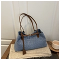 Blaue Leopardmuster-Tragetasche mit braunen Kunstlederriemen und dekorativem Metallring - Blau