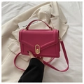 Chic rose red rectangular crossbody bag with a gold metal clasp and top handle - Rose Pink