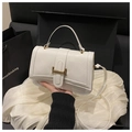 Elegant white quilted diamond pattern crossbody bag with golden clasp and top handle - White