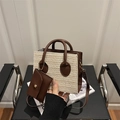Chic straw patchwork tote bag with dark brown leather straps and small envelope charm - Brown
