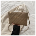 Khaki quilted crossbody bag with gold bow ornament and adjustable shoulder strap - Khaki
