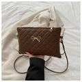 Deep brown quilted crossbody bag with gold metal bow and chic diamond lattice pattern - Brown