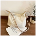 Minimalist beige canvas shoulder bag with silver ball knot detail and fashion logo - Off White