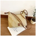Minimalist cream beige shoulder bag with dark brown straps and metal bead detail - Khaki