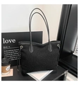 Chic black shearling tote bag for women with minimalist leather trim and gold details - Black