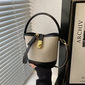 Fashion color-block bucket bag in cream canvas and black leather with gold clasp - Black