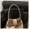 Leopard print underarm bag featuring beige patent leather trim and bow decoration - Khaki