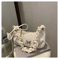 Chic cream white pleated shoulder bag featuring a silver metal butterfly ornament - White