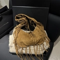Bohemian brown suede tote bag with fringe tassels on black gift box background - Brown
