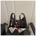 Retro dark brown oil wax leather shoulder bag with a cute cartoon cow charm pendant - Coffee