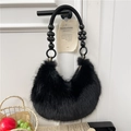 Faux fur handbag in black with thick braided handle and decorative bead accents - Black