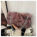 Fuzzy faux fur shoulder bag in dusty pink with a chunky silver metal chain strap - Pink