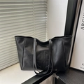 Minimalist large capacity black PU leather tote bag with round embossed logo for commuting - Black