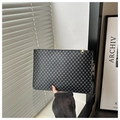Detail of grey geometric pattern handbag with gold metal zipper and wrist strap close-up - Vintage Monogram Black