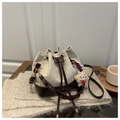 Chic beige canvas drawstring bucket bag with coffee brown leather trim and plush charm - Khaki With Pendant