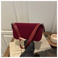 Detail of burgundy frosted leather handbag with silver magnetic buckle and strap - Red