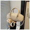 Beige faux leather oval handbag with plush charm and detachable shoulder strap - White With Pendant