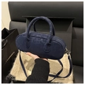 Navy blue faux suede cylinder shoulder bag with leopard print and silver hardware - Blue Without Charm