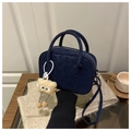 Navy blue faux suede crossbody bag with thick handle and plush eyeball charm accessory - Blue (With Pendant)