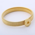 Reggimaniche elastiche in metallo dorato con trama a spirale e fibbia rotonda - Oro