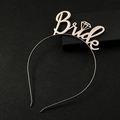 Rose gold metal bride headband featuring cursive text and a diamond-shaped dot - Light Rose Gold