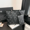 Black large tote bag with matching pouch featuring all-over diamond letter pattern - Black