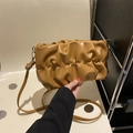 Chic brown ruched cloud bag in textured faux leather with adjustable shoulder strap - Brown