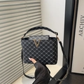 Retro grey monogram bucket bag with gold V-hardware and adjustable shoulder strap - Black