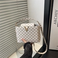 Elegant plaid crossbody bag in cream and brown with gold V-buckle for autumn winter - White