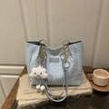 Light blue tote bag with star embossed texture, golden chain strap, and plush charm - With Pendant / Blue