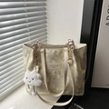 Light yellow tote bag with star moon pattern and plush cloud charm accessory - Yellow