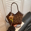 Brown leopard print bucket bag with vintage teddy bear charm and sleek leather handle - Leopard Coffee
