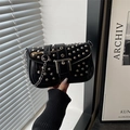 Punk style black glossy leather shoulder bag with silver rivets and metallic buckle - Black