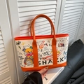 Graffiti canvas shopper in oranje en gebroken wit met trendy straatkunstpatronen - Oranje