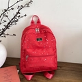 Zaino casual rosso con stampe a stelle bianche e logo in metallo per stile quotidiano - Rosso