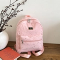 Pink canvas backpack featuring silver star prints and metallic JUHAI logo plaque - Pink