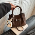 Deep brown matte leather crossbody bag with contrast stitching and plush bear charm - With Pendant / Brown